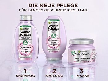 Garnier Wahre Schätze Reiswasser Ritual & Stärke Haarpflegeserie vor einem fliederfarbenen Hintergrund