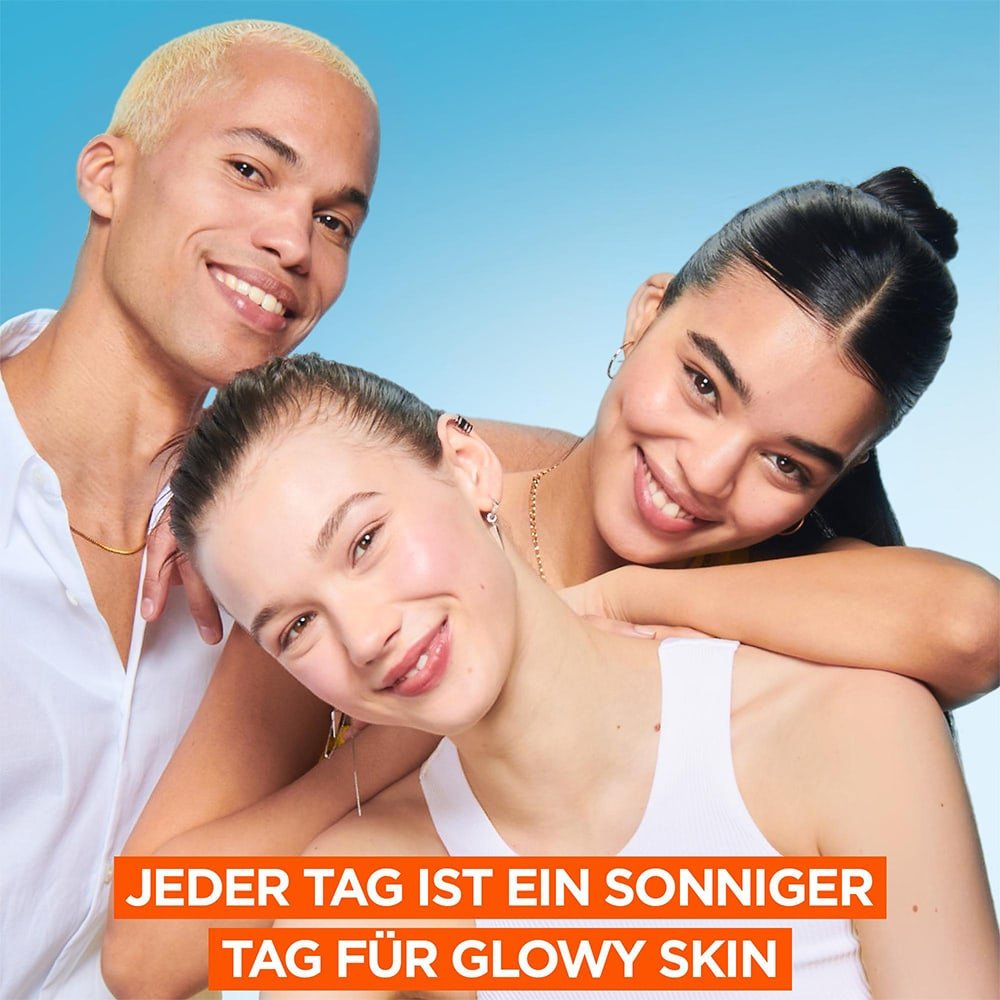 Drei lächelnde Personen