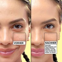 Garnier model von vorne. Sie zeigt dass das Wonder Tint All-In-One Getöntes Fluid ganz einfach und angenehm Flecken abdeckt!