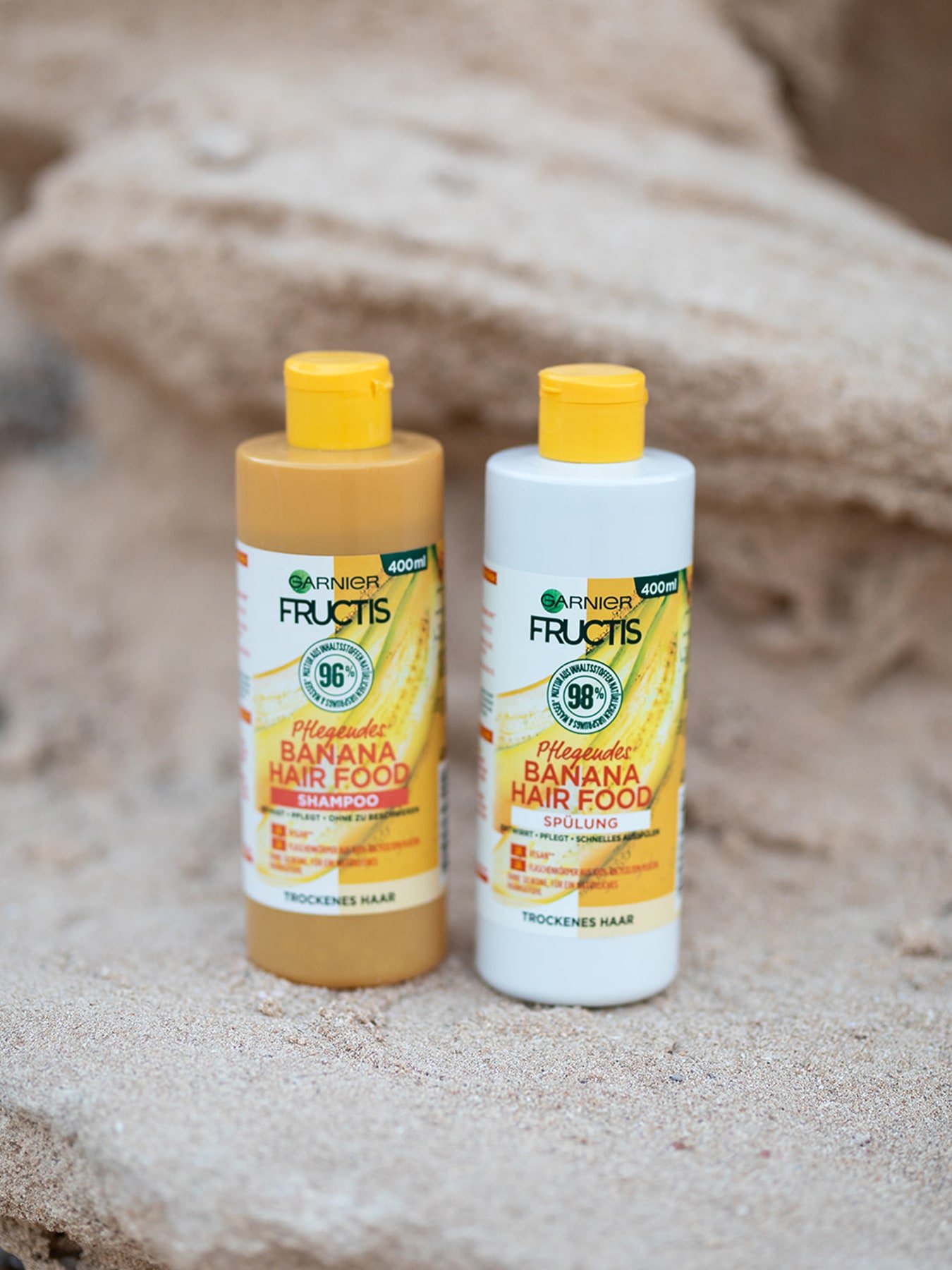 Produktabbildungen von Garnier Fructis pflegendes Shampoo und Spülung mit Banane