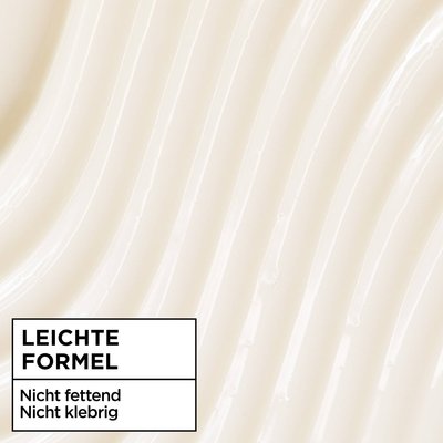Die weiche Texturder Leave In Creme sanfte Hafermilch, in einem Cremefarbenem Ton