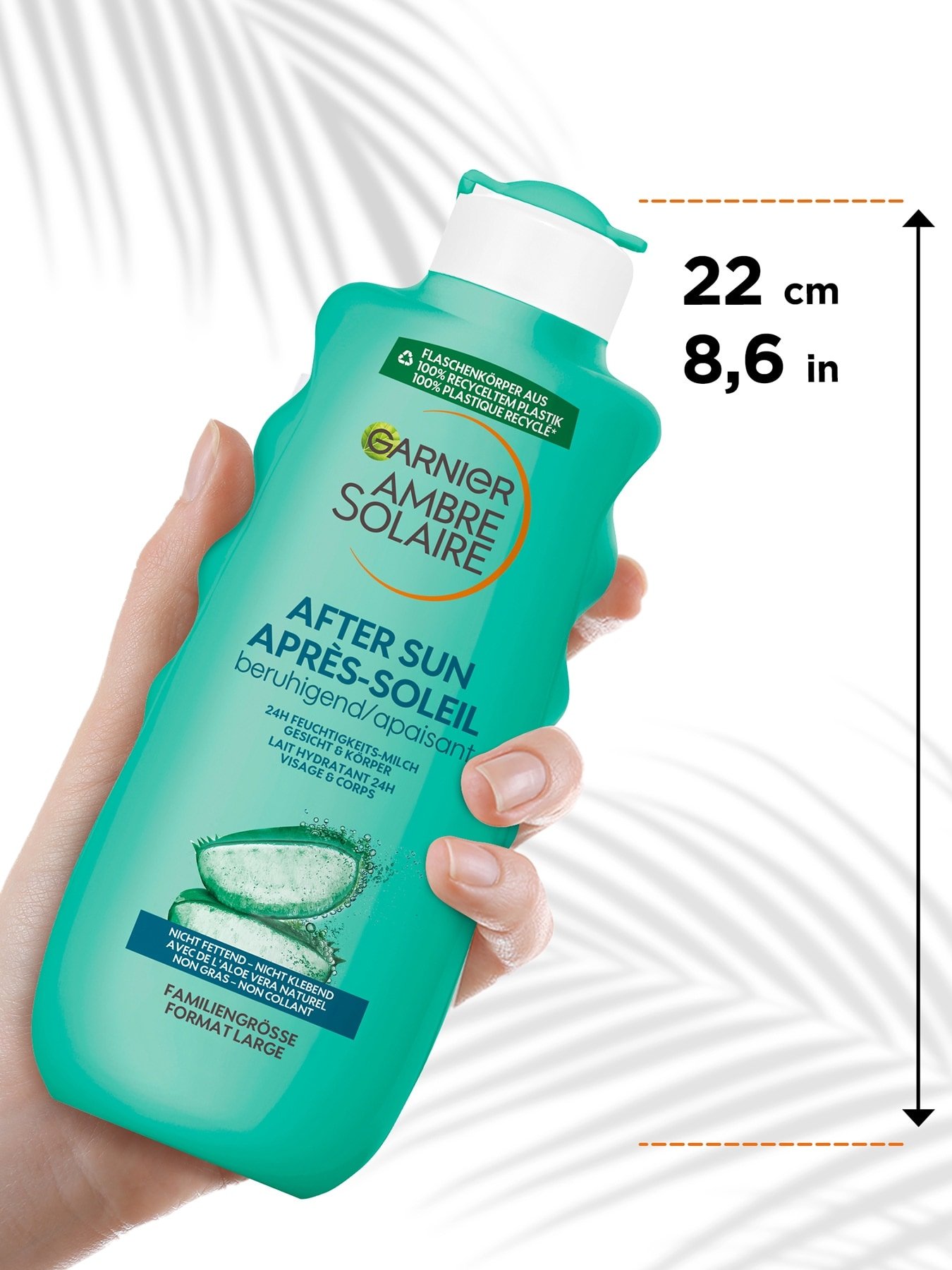 After Sun 24h Feuchtigkeits-Milch - Produkt von einer Hand gehalten mit Größenangabe