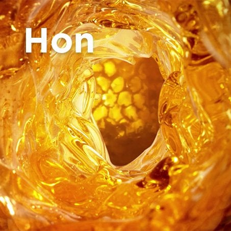 Honig und Bienenwaben in Detailansicht