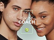 Zwei Personen blicken in die Kamera zudem das Garnier Skin Coach Logo 