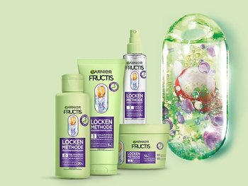 Fructis Locken Methode Produktreihe und Darstellung der Inhaltsstoffe in einer Flüssigkeitsblase